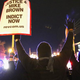 Demonstrators are confronted by police as they block a street during a protest on Nov. 24, 2014, in Ferguson, Mo., ahead of the St. Louis County grand jury announcement in the Michael Brown case.
Scott Olson/Getty Images